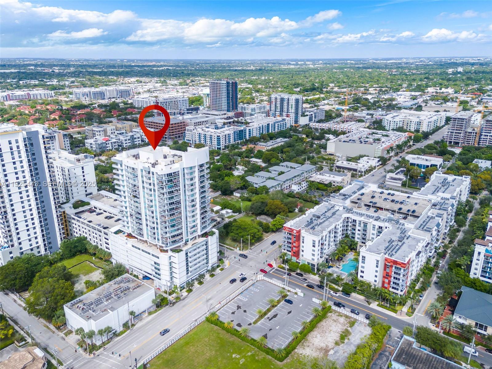 315 Northeast 3rd Avenue, Unit 1805 Fort Lauderdale, FL 33301 - Photo 43 of 43 an aerial view of a city with lots of residential buildings ocean and mountain view in back