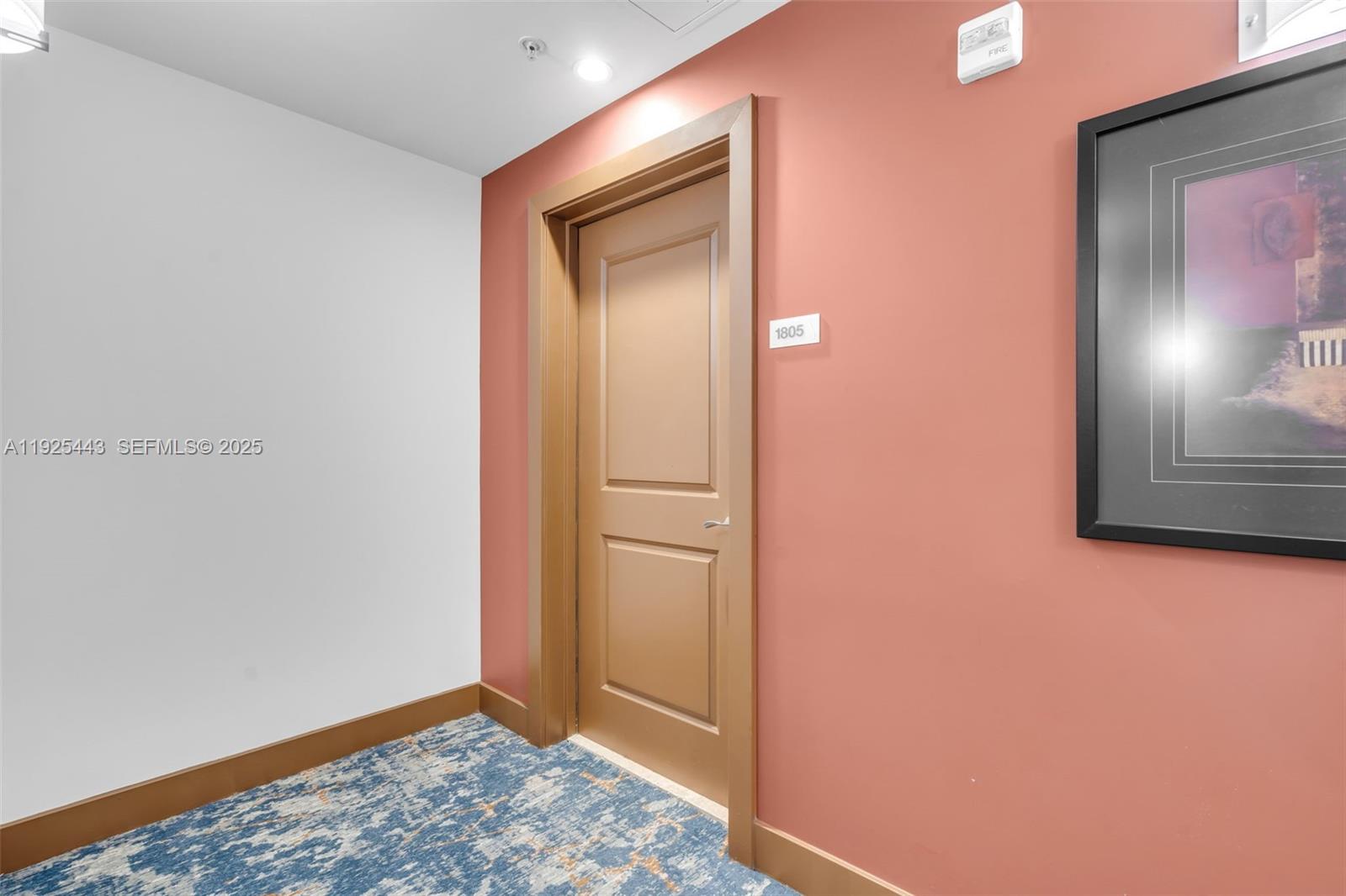 315 Northeast 3rd Avenue, Unit 1805 Fort Lauderdale, FL 33301 - Photo 5 of 43 a view of hallway with wooden floor
