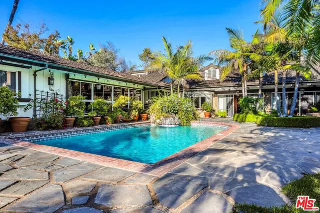 front view of a house with a small yard