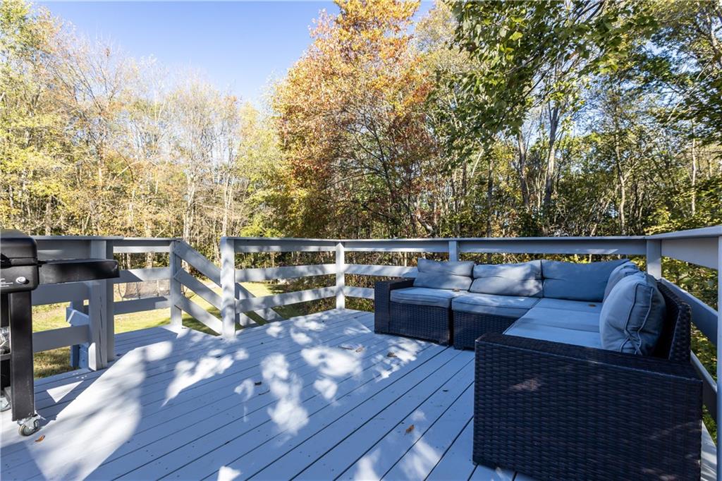 a view of a roof deck with couches