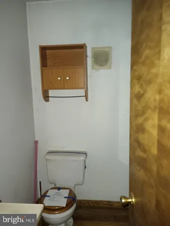 a bathroom with a toilet