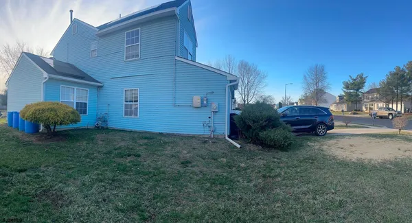a house view with a garden space