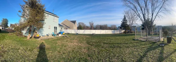 a view of backyard with green space
