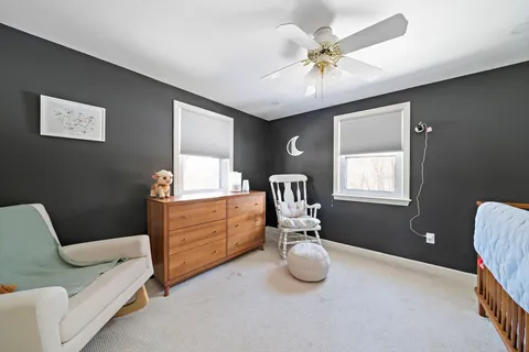 a room with furniture and a window