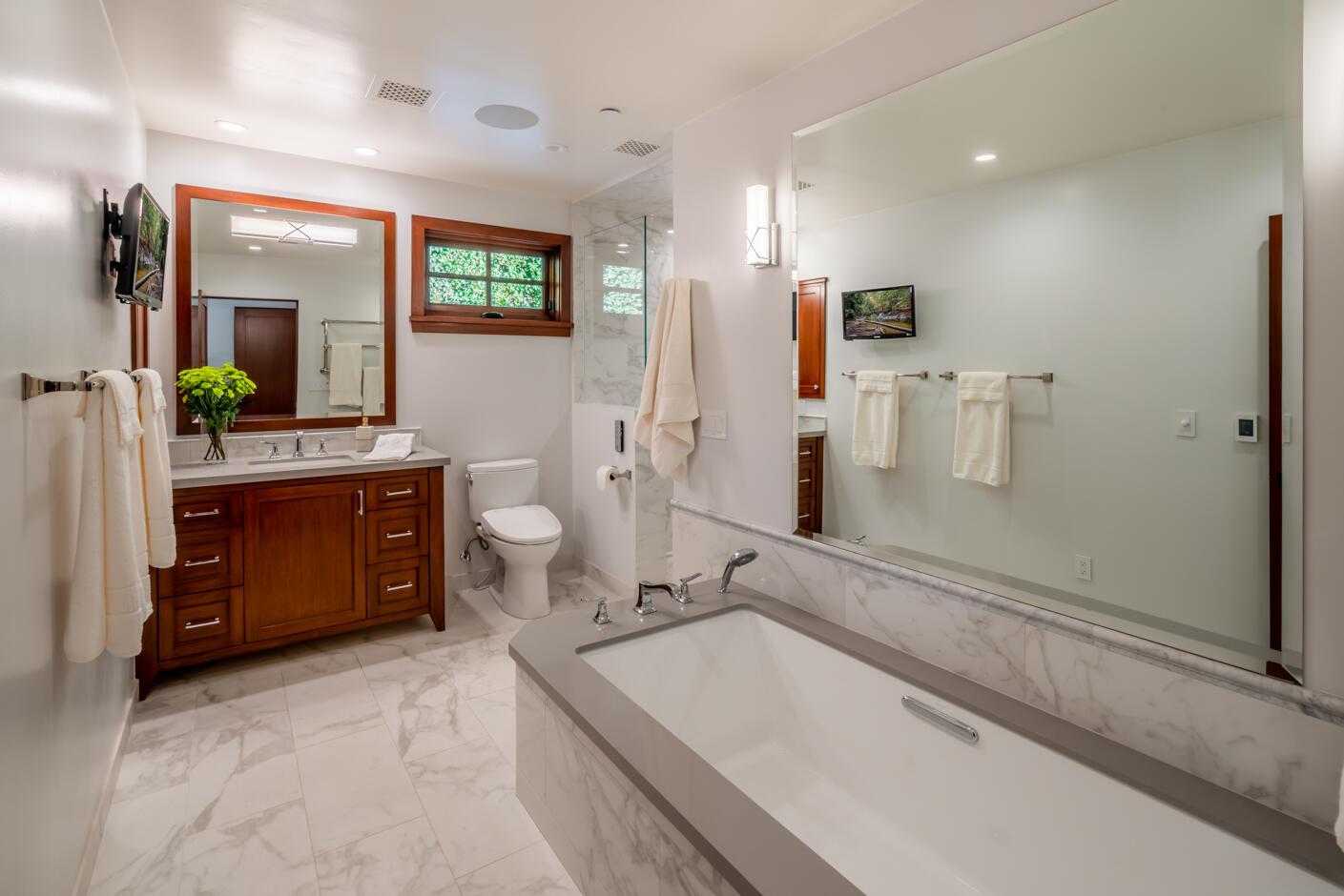 2162 East Valley Road Montecito, CA 93108 - Photo 11 of 23 a spacious bathroom with a tub sink and mirror