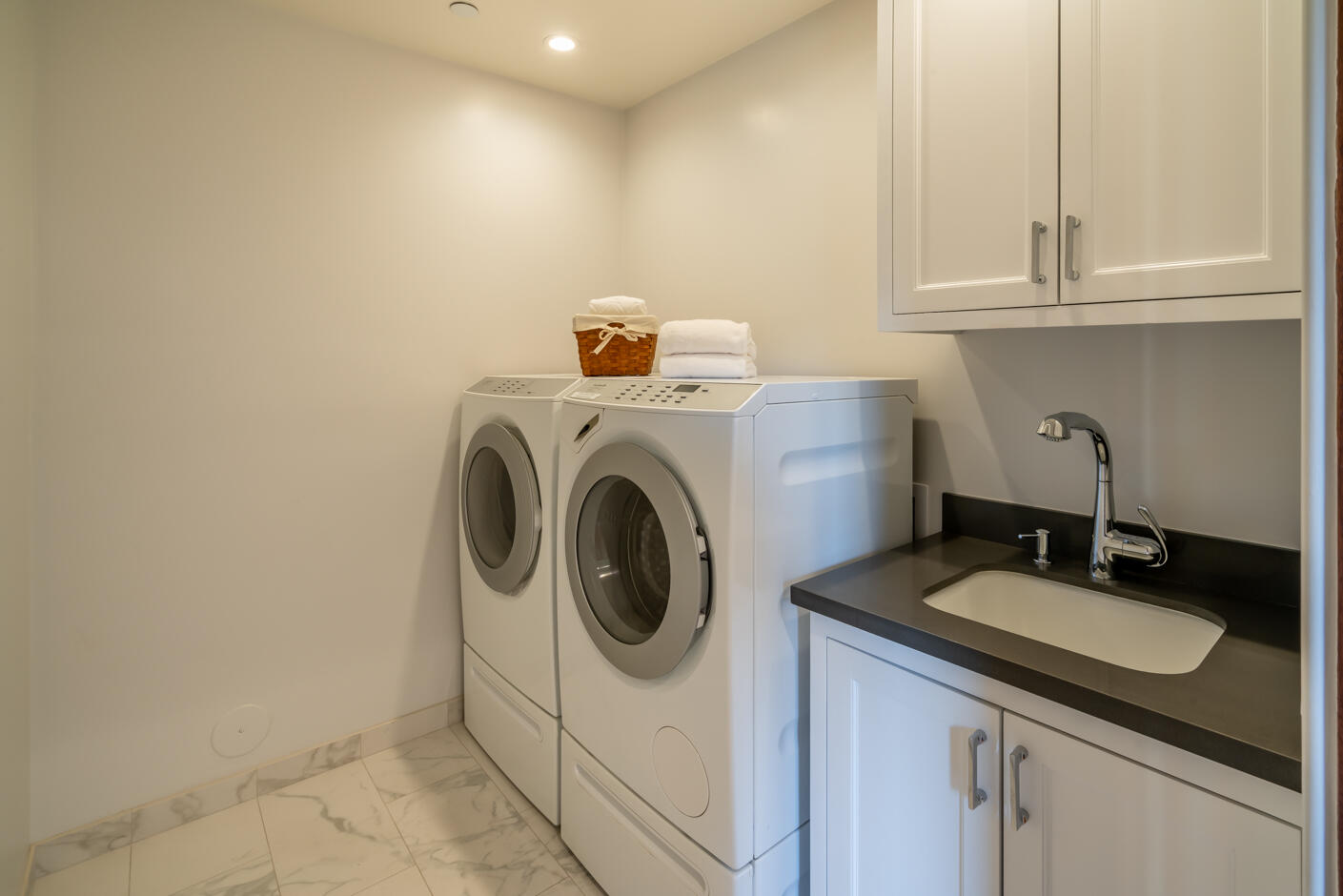 2162 East Valley Road Montecito, CA 93108 - Photo 16 of 23 a utility room with sink dryer and washer