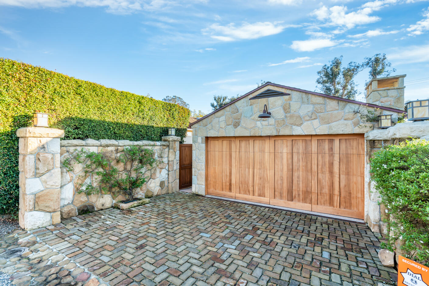 2162 East Valley Road Montecito, CA 93108 - Photo 18 of 23 a front view of a house with garden