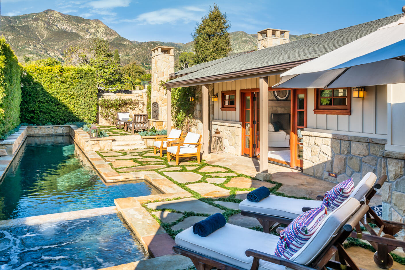 2162 East Valley Road Montecito, CA 93108 - Photo 23 of 23 a view of a patio with couches table and chairs and potted plants