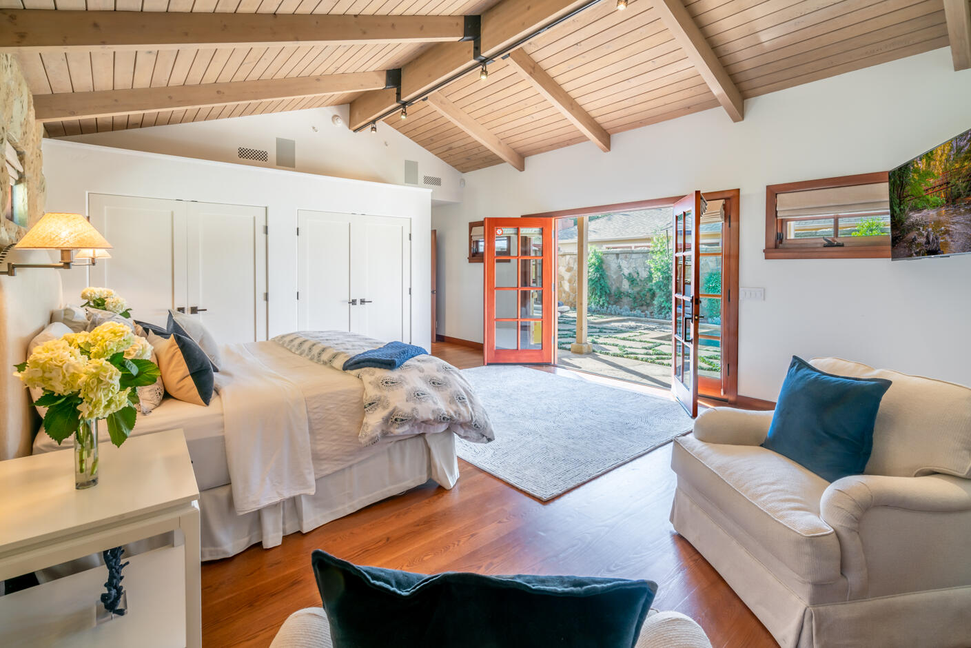 2162 East Valley Road Montecito, CA 93108 - Photo 3 of 23 a bedroom with furniture and a large window