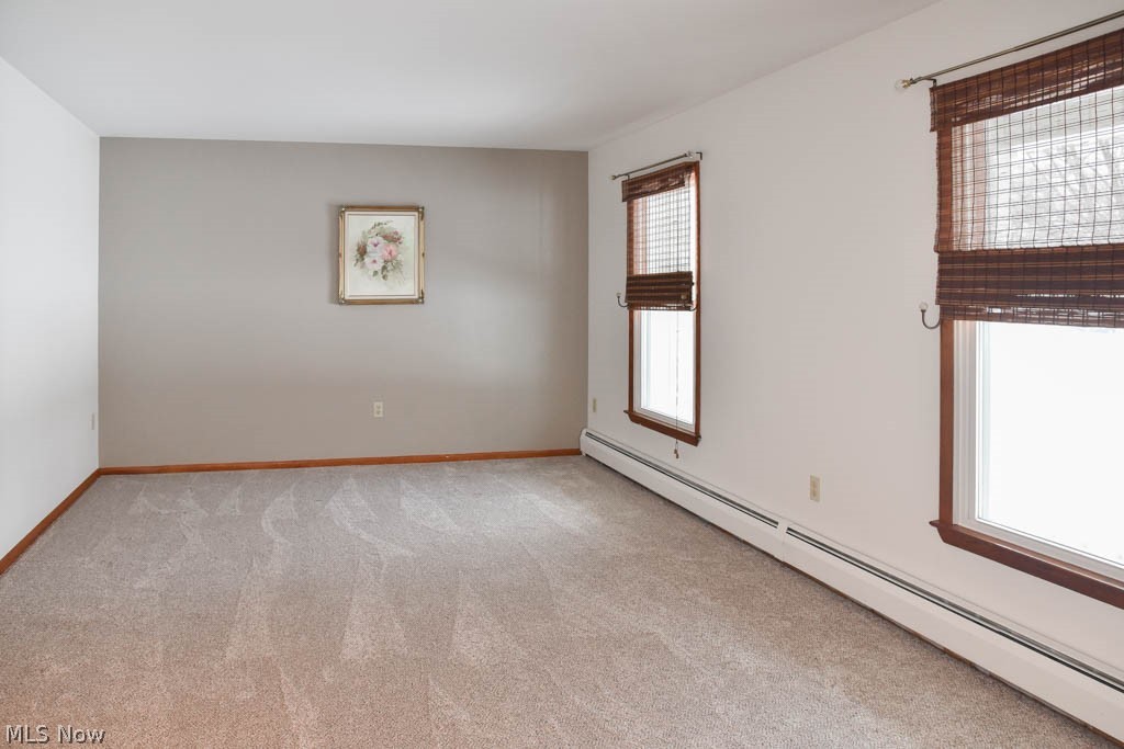 6094 Hanna Road Ravenna, OH 44266 - Photo 2 of 31 Huge living room with brand new carpet.