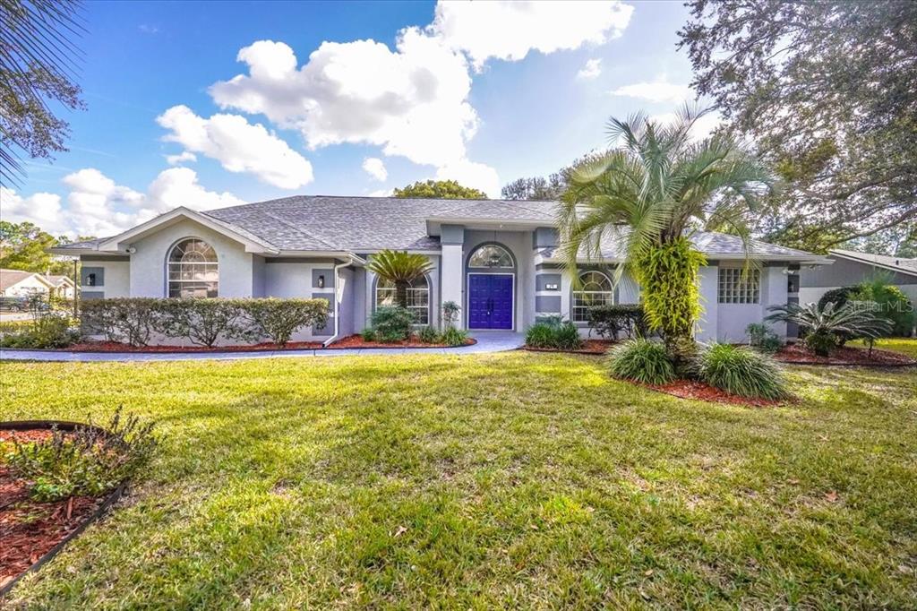29 Linder Circle Homosassa, FL 34446 - Photo 1 of 1 a front view of a house with a yard