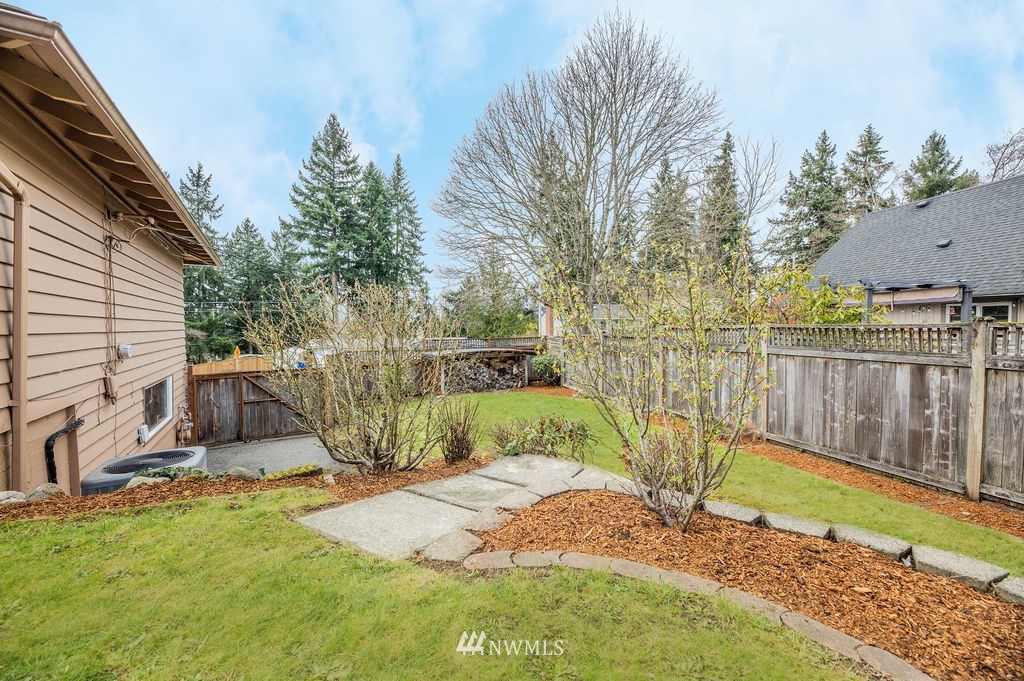 316 158th Place Southeast Bellevue, WA 98008 - Photo 24 of 29 a view of a backyard with a small cabin
