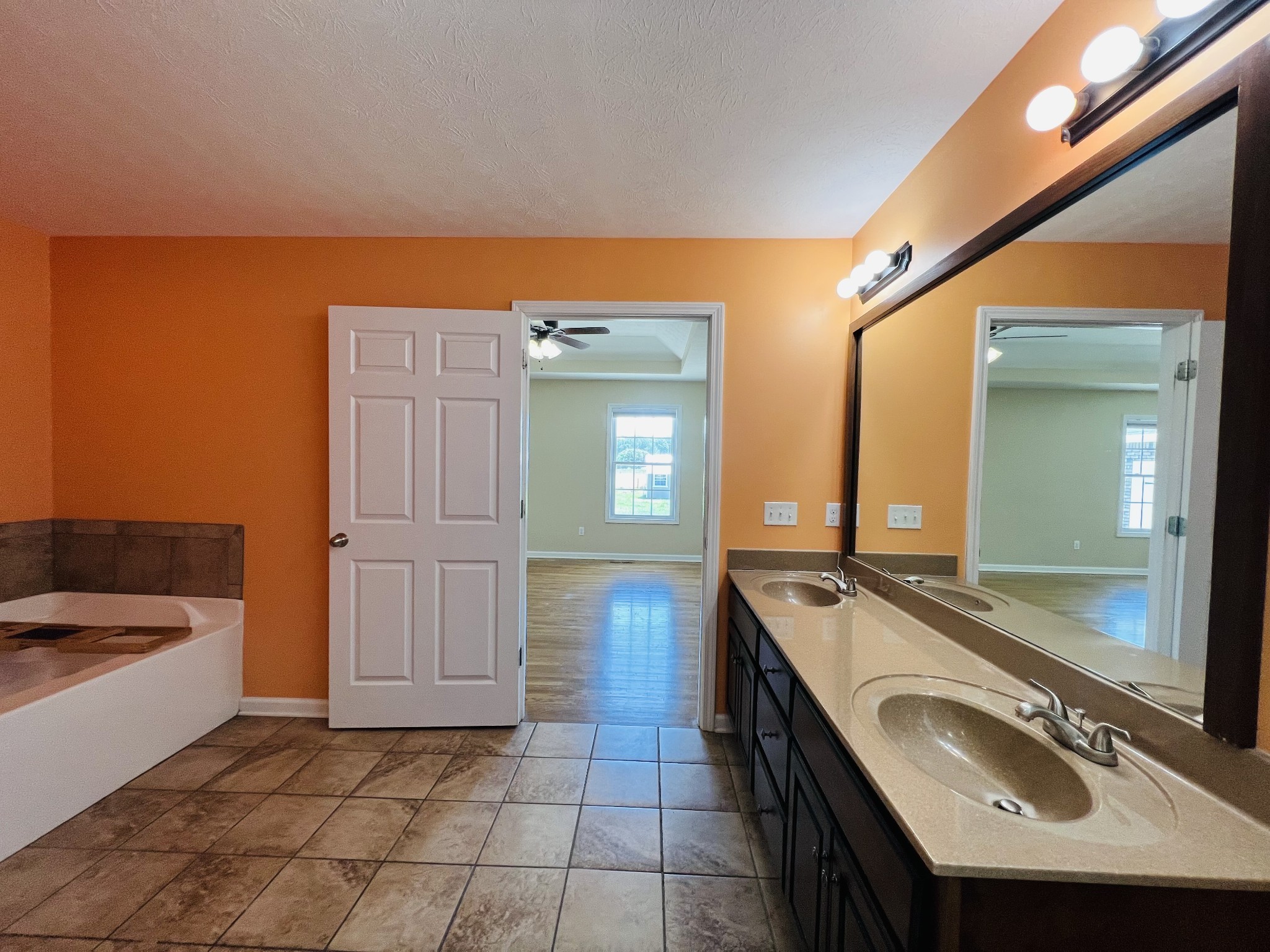 663 Jackson Road Portland, TN 37148 - Photo 21 of 32 a bathroom with a sink and a bathtub