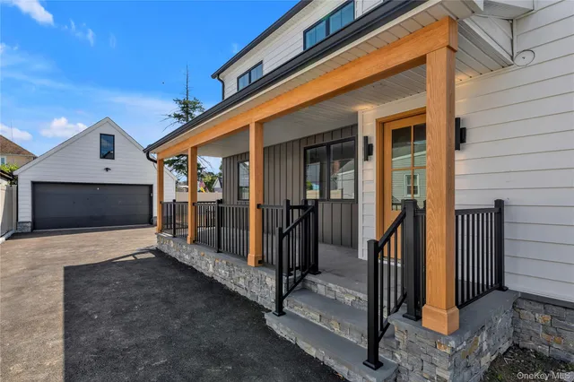 a view of a house with porch and wooden floor
