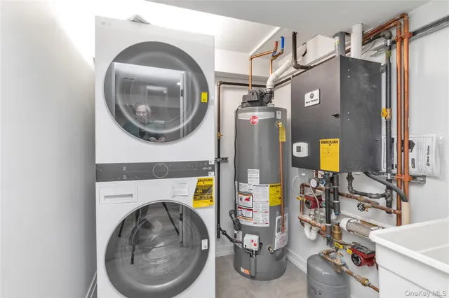 a bathroom with a sink mirror vanity and toilet