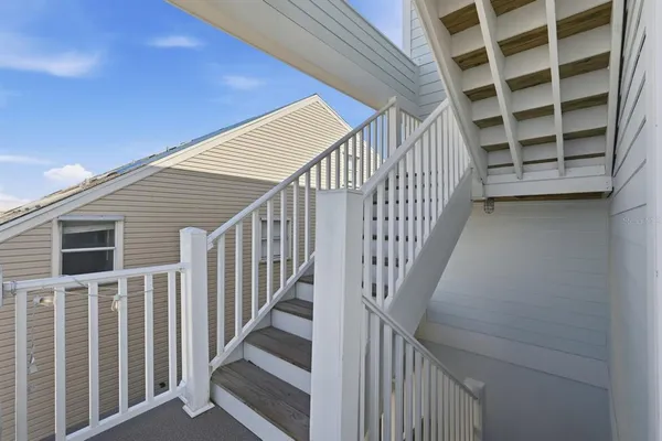 a view of a floor to ceiling window and an ocean