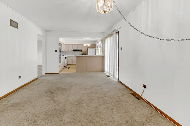 a bedroom with a bed and a mirror