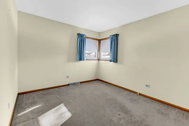 a bathroom with a sink a toilet and a shower