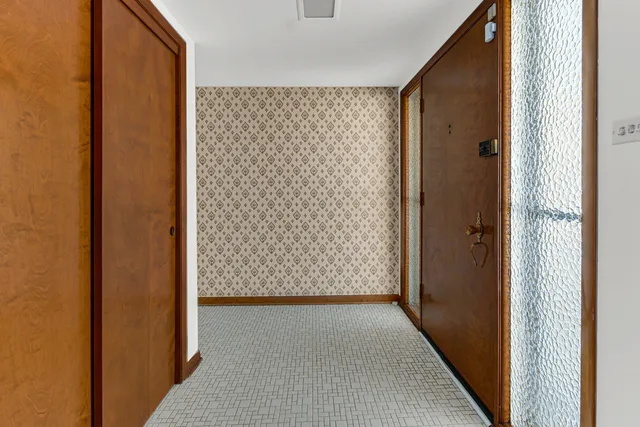 a view of road with large trees