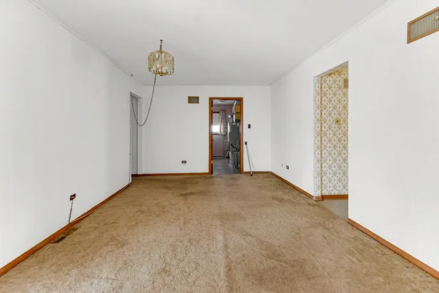 a view of empty room with painted walls