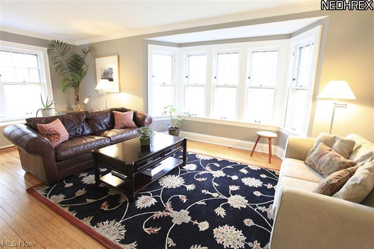 15803 Fernway Road Cleveland, OH 44120 - Photo 3 of 25 Almost straight out of a magazine, this Living Room, freshly painted and comfortably furnished allows you to easily picture yourself here!