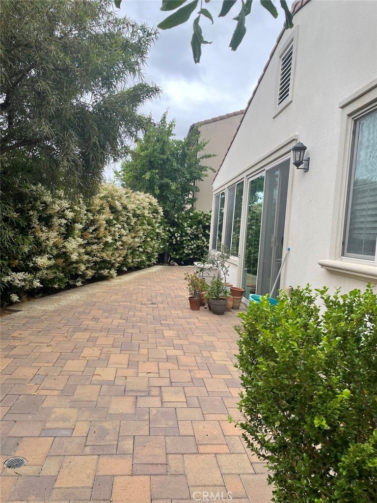 100 Desert Bloom Irvine, CA 92618 - Photo 14 of 15 a view of a house with a yard