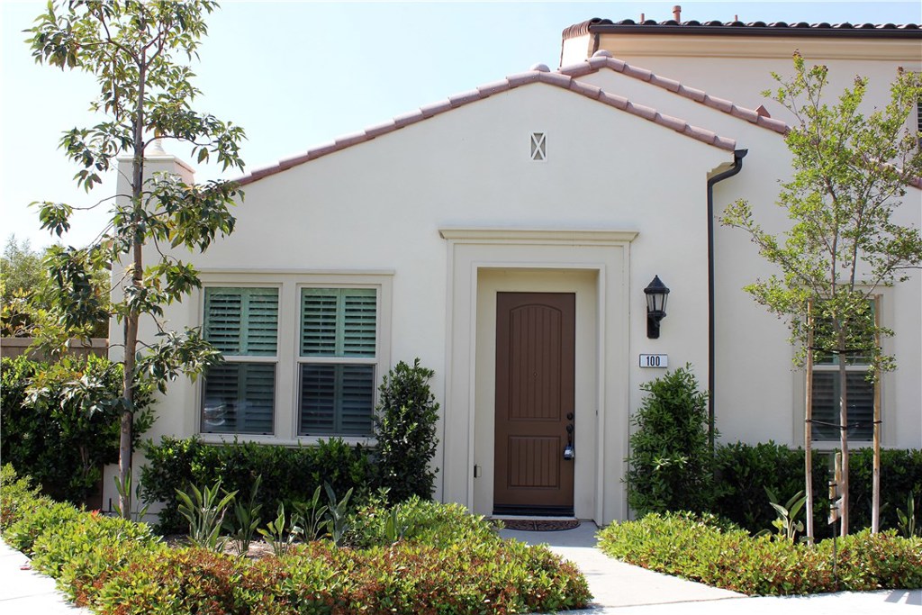 100 Desert Bloom Irvine, CA 92618 - Photo 9 of 15 a view of a house with a yard