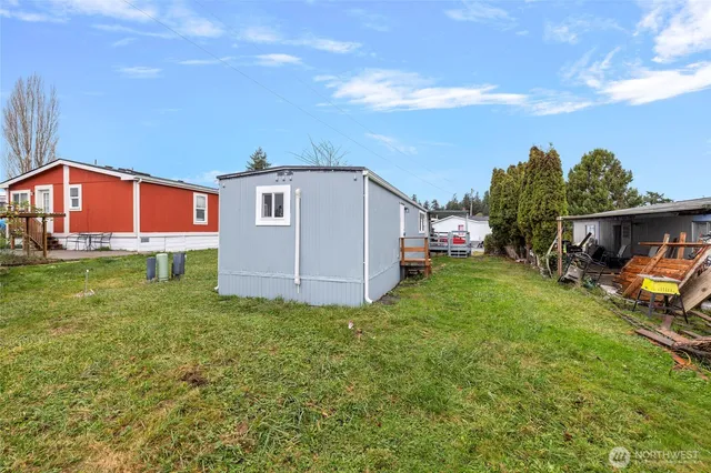 a backyard of a house with seating space