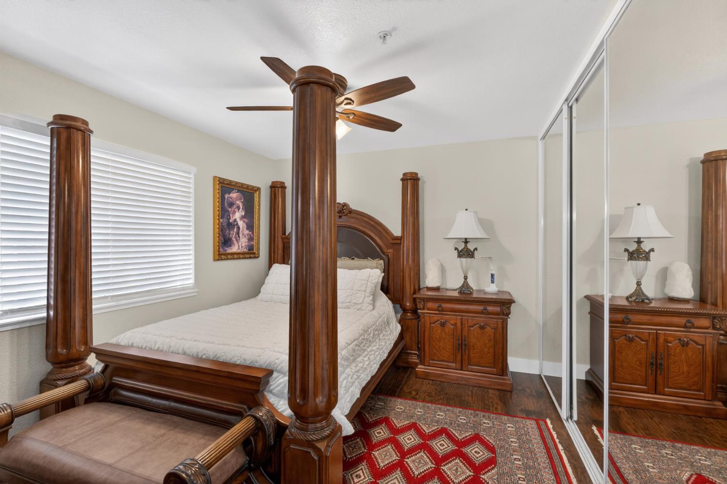 8020 Walerga Road, Unit 1140 Antelope, CA 95843 - Photo 24 of 37 a bedroom with a bed and cabinets