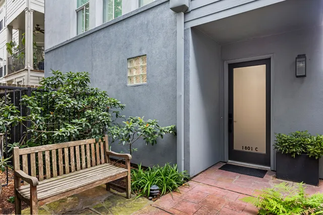 a view of porch with a bench