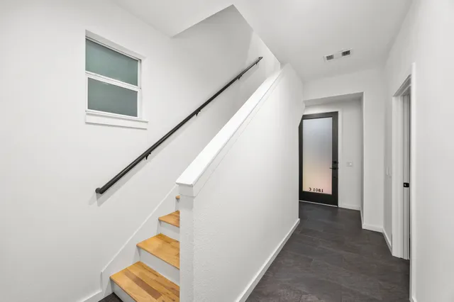 a view of a hallway with entryway