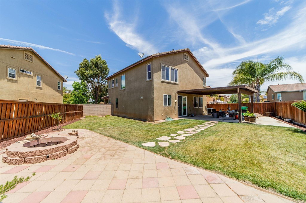 31047 Rose Circle Murrieta, CA 92563 - Photo 18 of 20 a house view with a swimming pool
