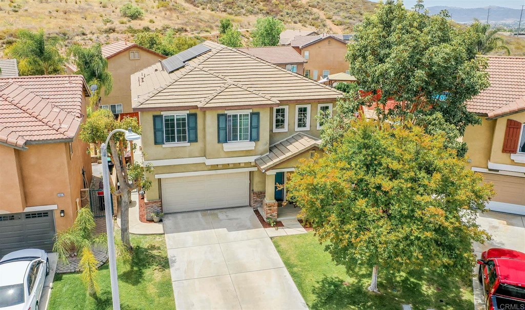 31047 Rose Circle Murrieta, CA 92563 - Photo 20 of 20 a front view of a house with a garden