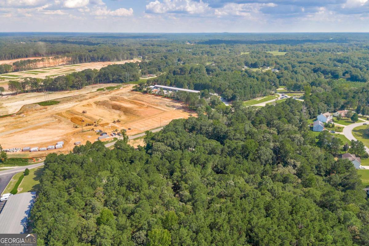 755 Harry McCarty Road Bethlehem, GA 30620 - Photo 14 of 28 an aerial view of residential houses with outdoor space and river
