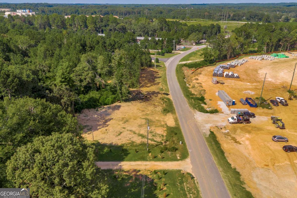 755 Harry McCarty Road Bethlehem, GA 30620 - Photo 18 of 28 a view of a swimming pool with a yard and mountain view