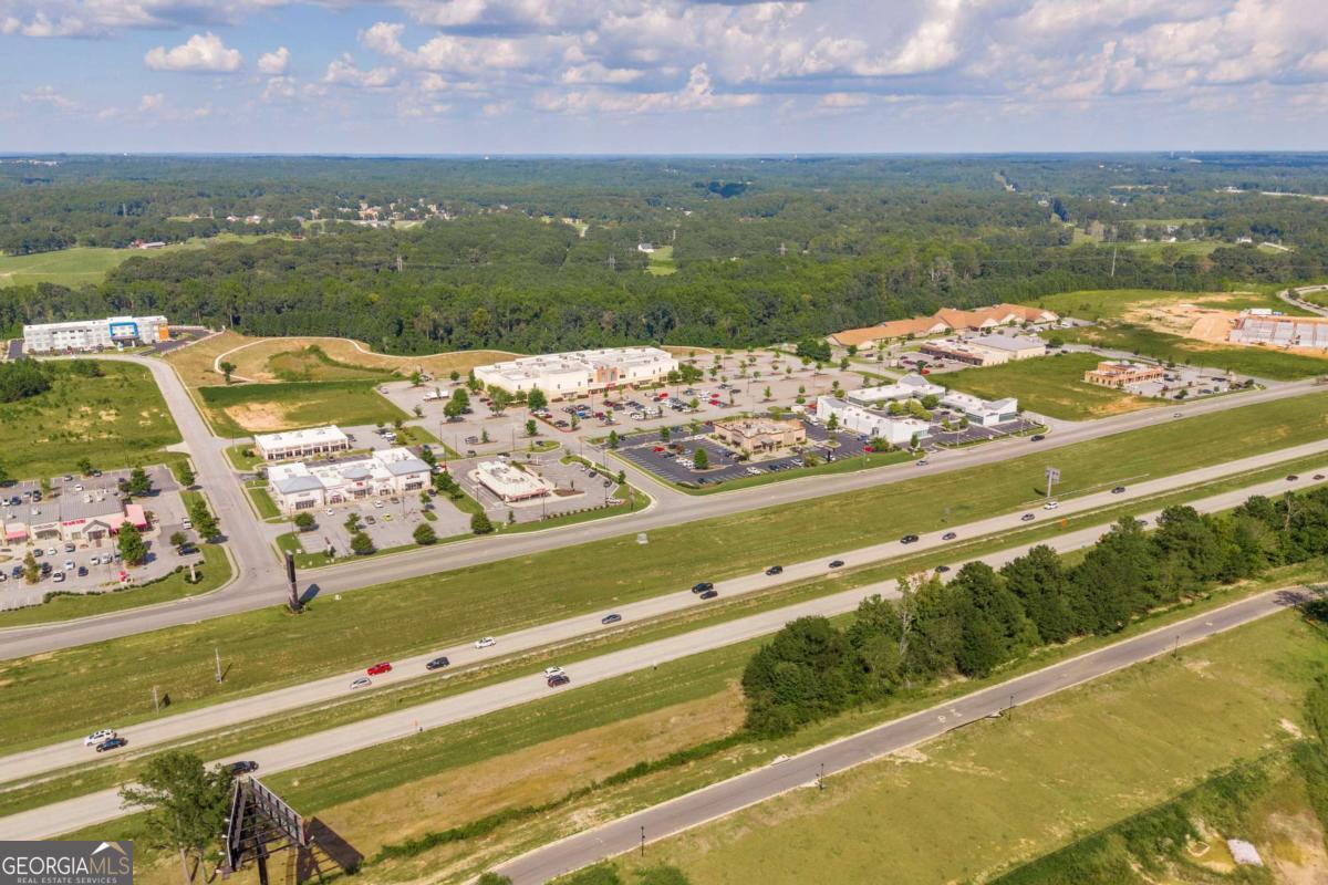 755 Harry McCarty Road Bethlehem, GA 30620 - Photo 22 of 28 a view of a lake with a city view