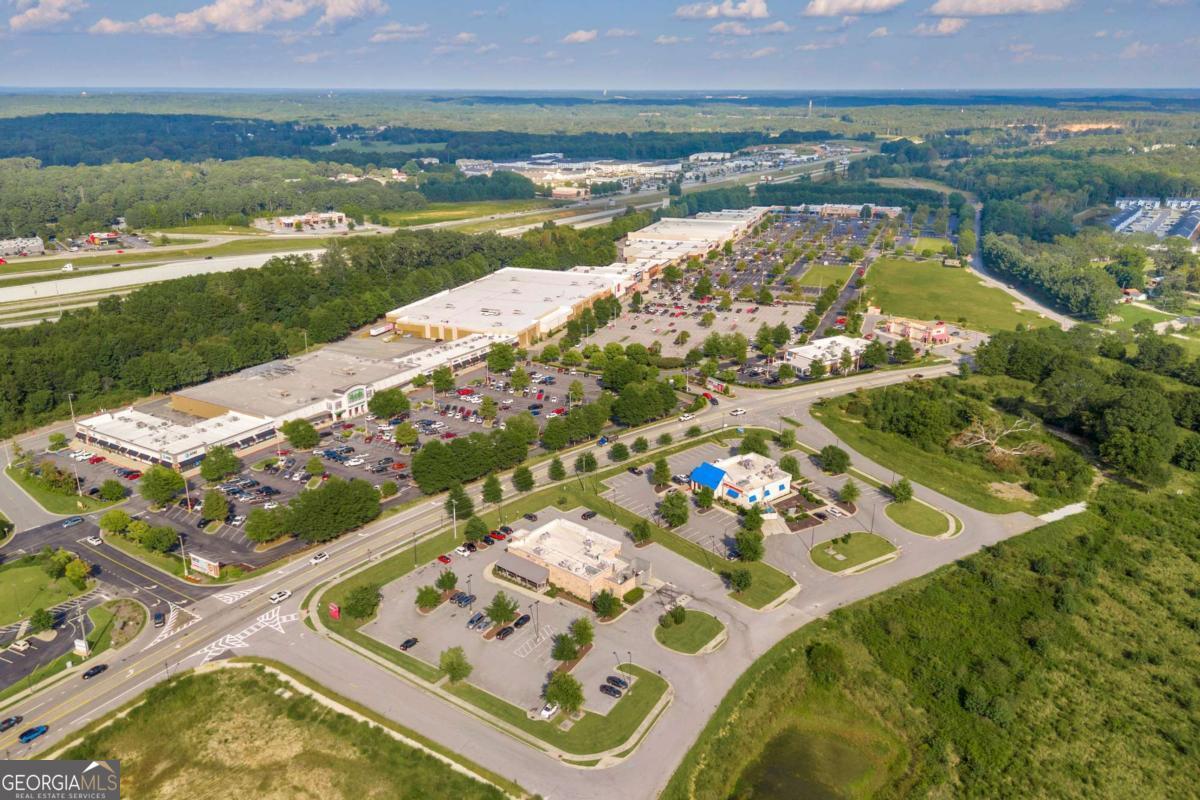 755 Harry McCarty Road Bethlehem, GA 30620 - Photo 26 of 28 a view of a swimming pool with a yard