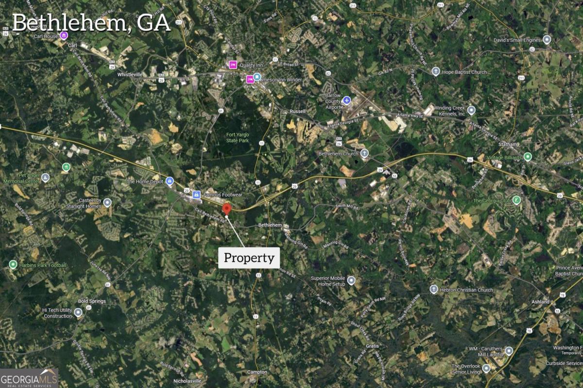 755 Harry McCarty Road Bethlehem, GA 30620 - Photo 4 of 28 a sign that is sitting in front of a tree