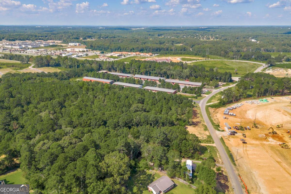 755 Harry McCarty Road Bethlehem, GA 30620 - Photo 10 of 28 an aerial view of residential houses with outdoor space and river