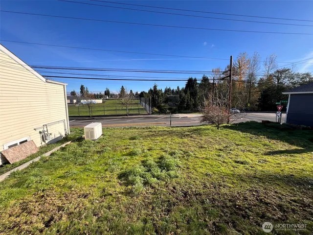a view of a backyard with garden