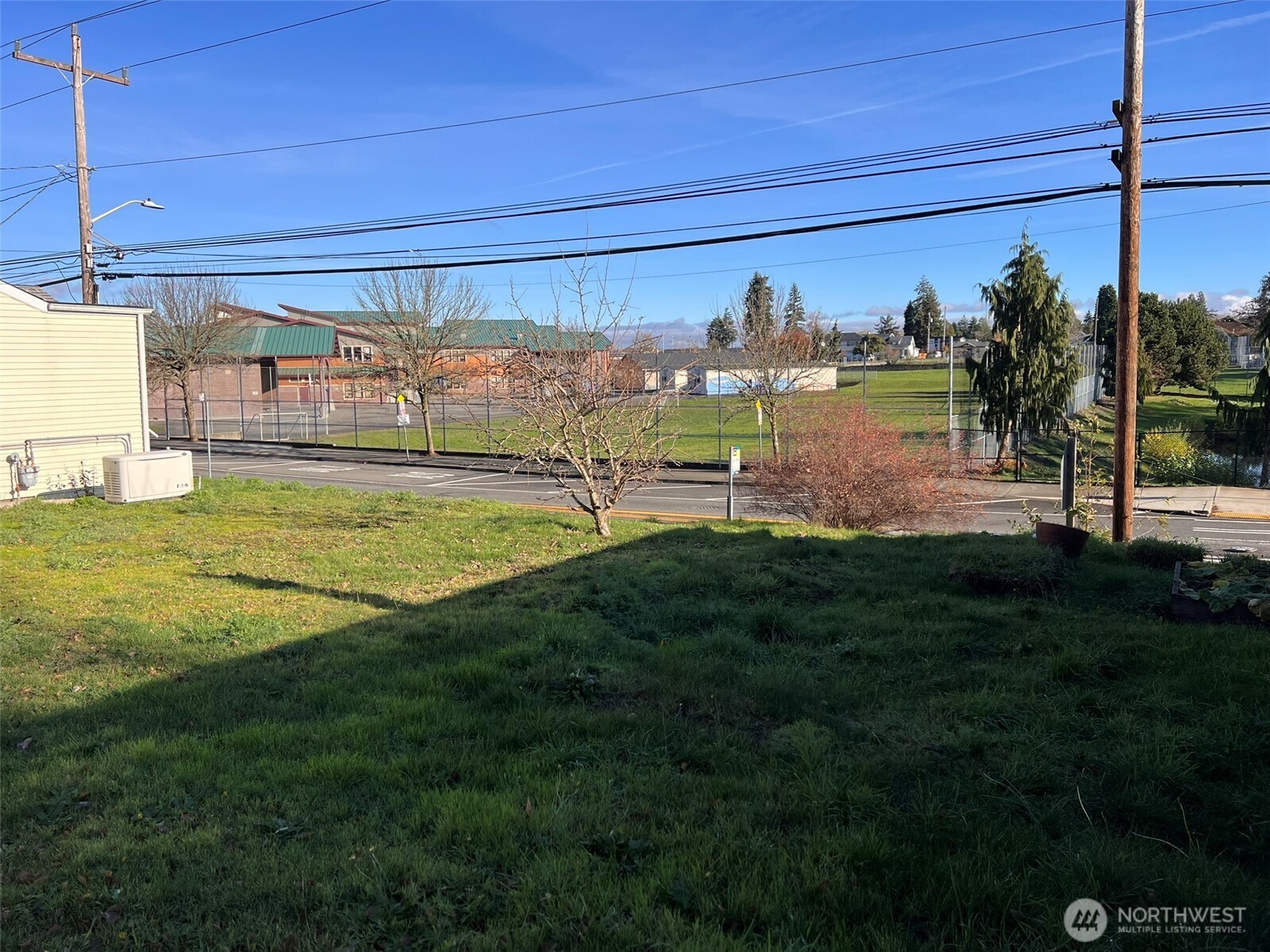 10049 8th Avenue Southwest Seattle, WA 98146 - Photo 10 of 20 a view of a swimming pool with an outdoor seating and a yard
