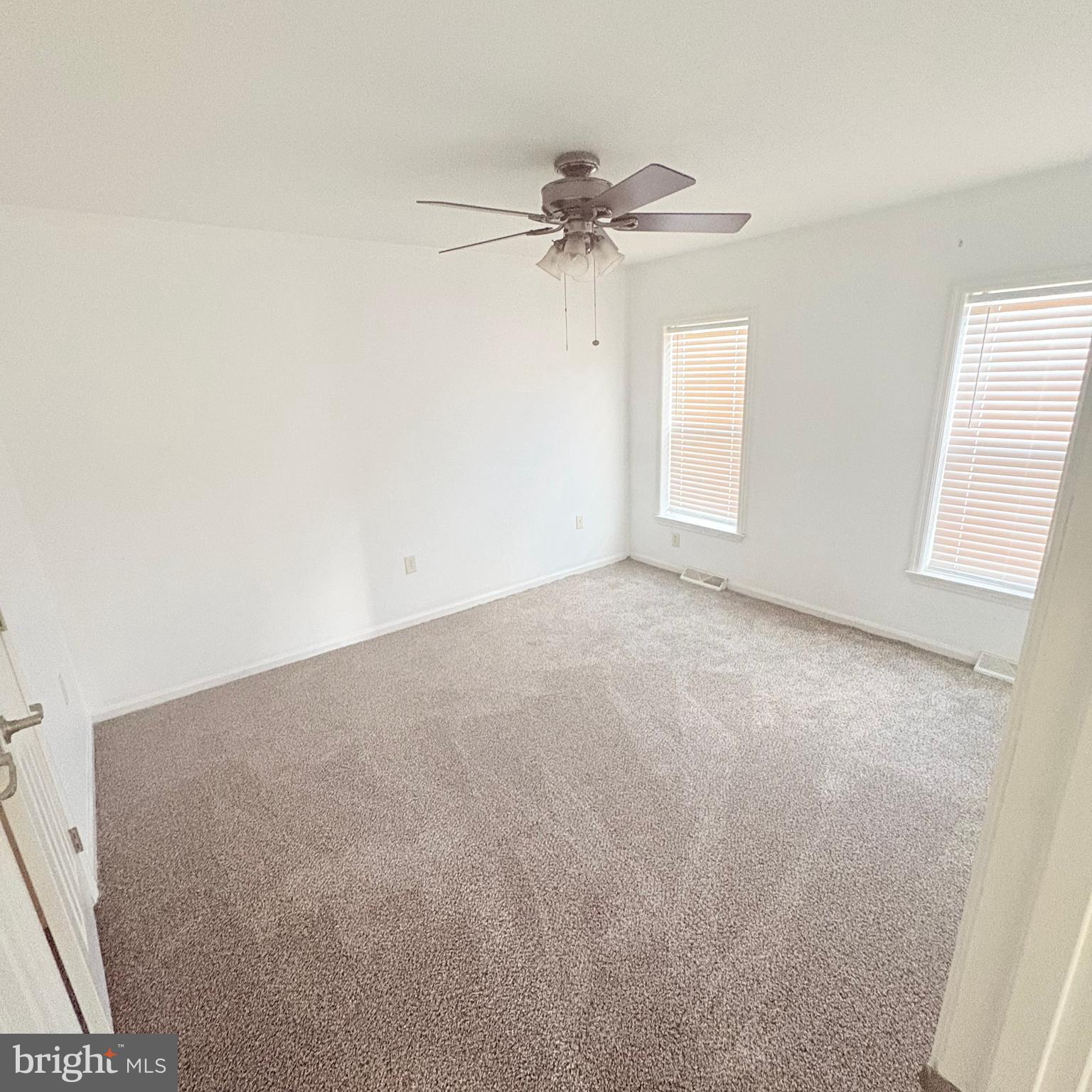 312 Winterset Road Garnet Valley, PA 19060 - Photo 11 of 11 a view of an empty room with a window