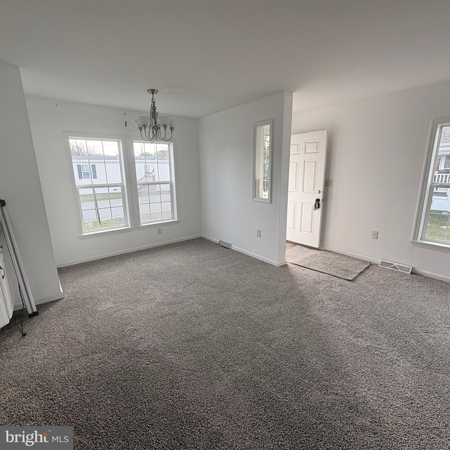 312 Winterset Road Garnet Valley, PA 19060 - Photo 7 of 11 a view of an empty room with windows