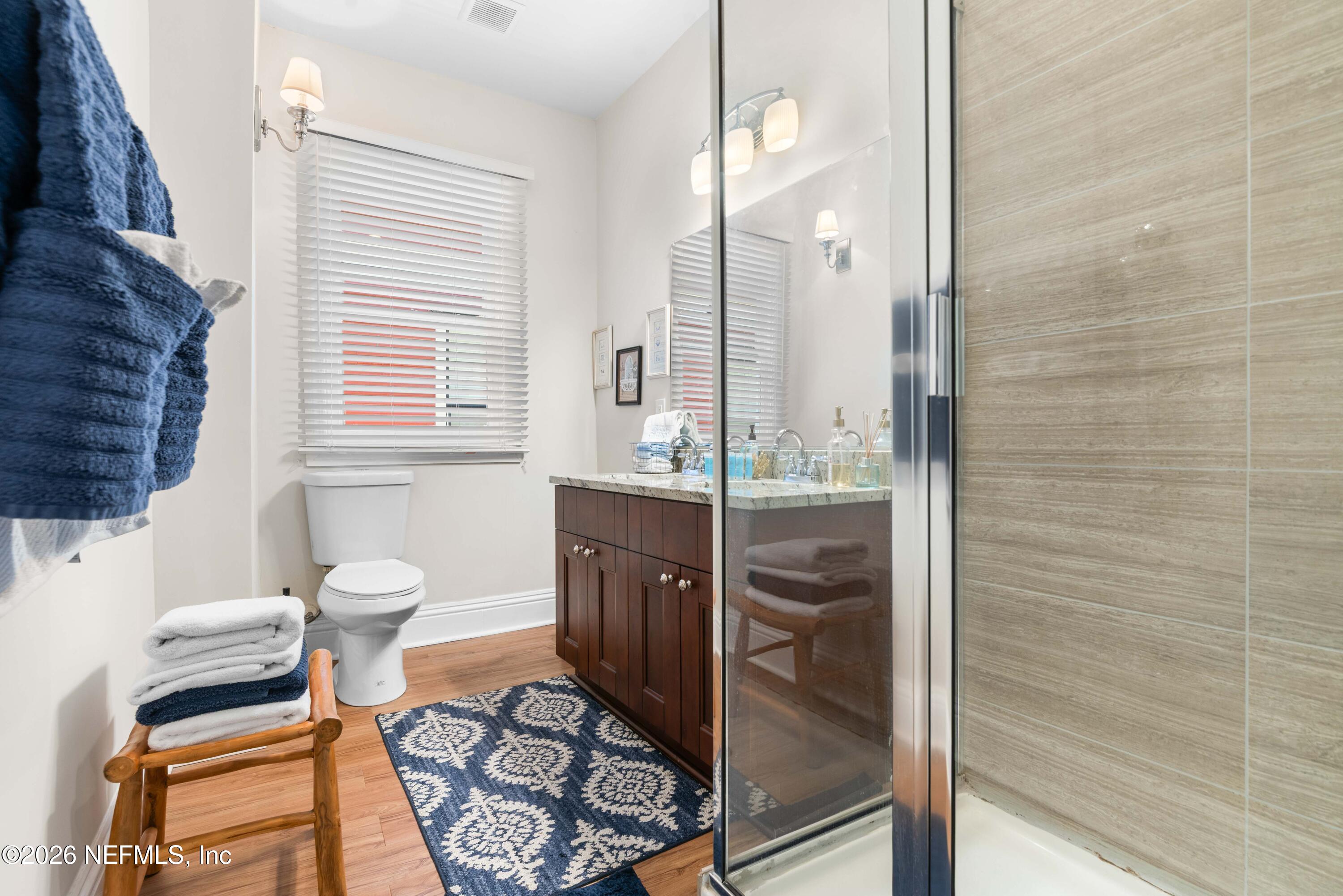 1138 Walnut Street Jacksonville, FL 32206 - Photo 13 of 37 a bathroom with a sink a toilet and shower