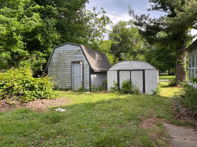 a backyard of a house with lots of green space