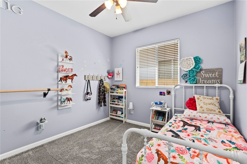 19735 Edmonds Place Saugus, CA 91350 - Photo 13 of 34 a bedroom with a bed and a window