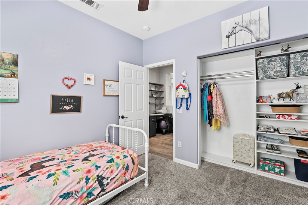 19735 Edmonds Place Saugus, CA 91350 - Photo 14 of 34 a bedroom with bed and cabinets