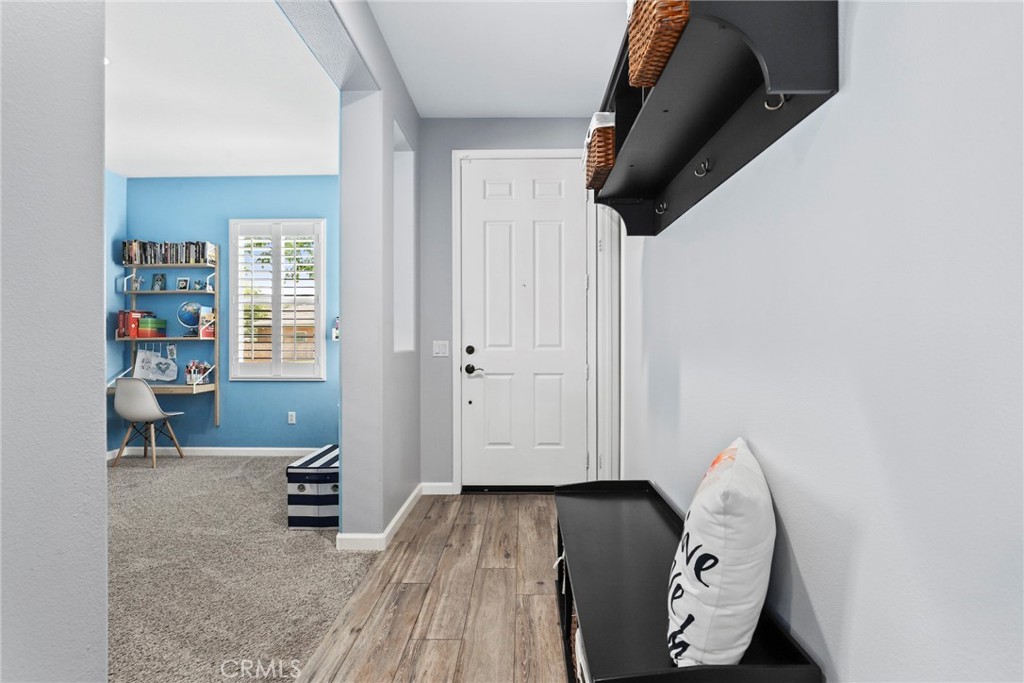 19735 Edmonds Place Saugus, CA 91350 - Photo 2 of 34 an entryway and livingroom with furniture