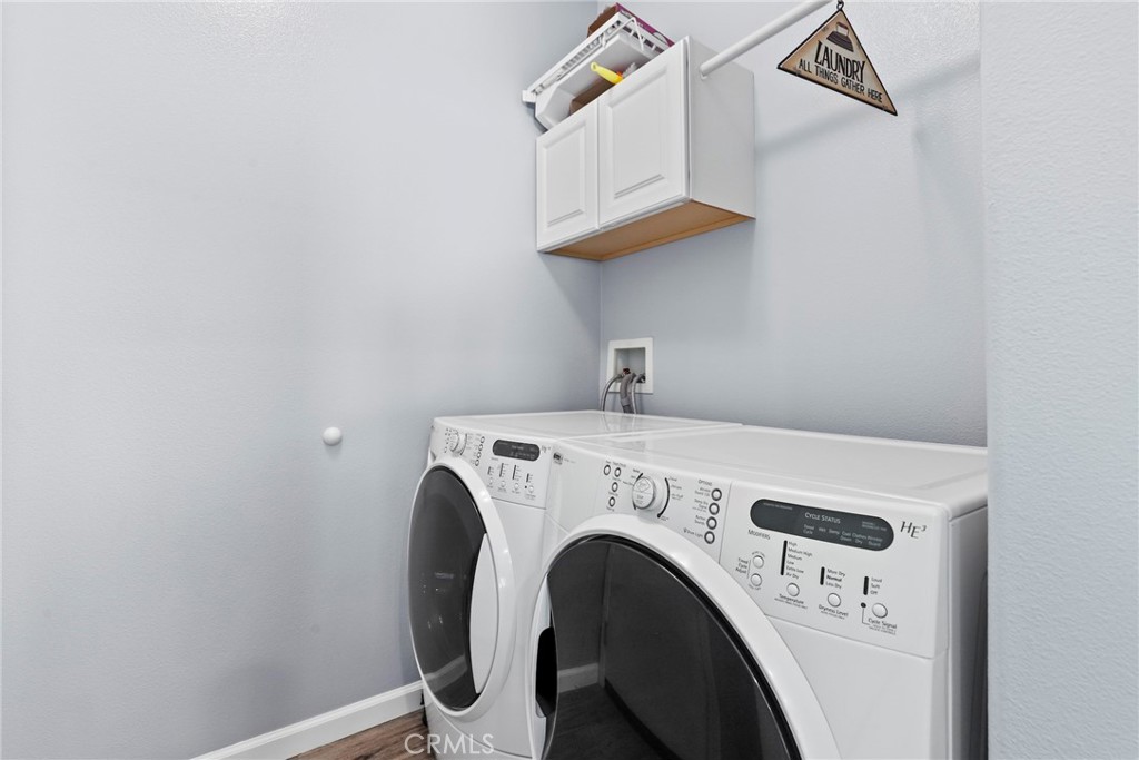 19735 Edmonds Place Saugus, CA 91350 - Photo 21 of 34 a utility room with dryer and washer