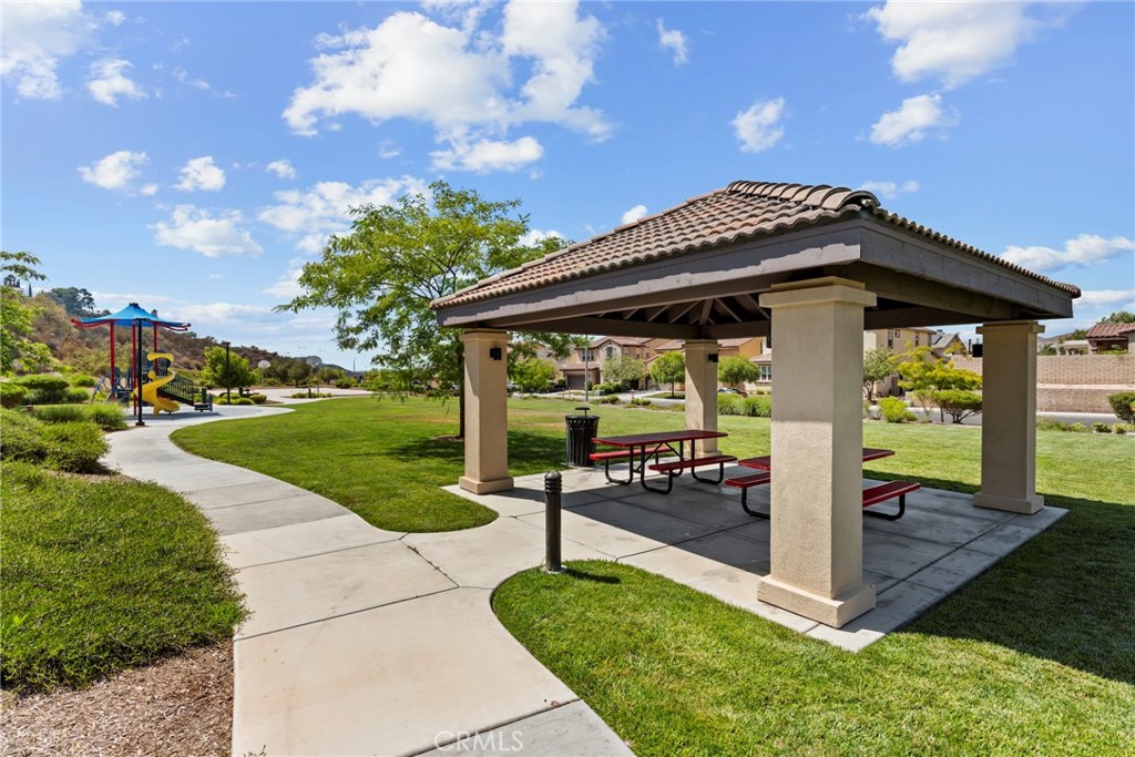 19735 Edmonds Place Saugus, CA 91350 - Photo 30 of 34 a front view of a house with a yard